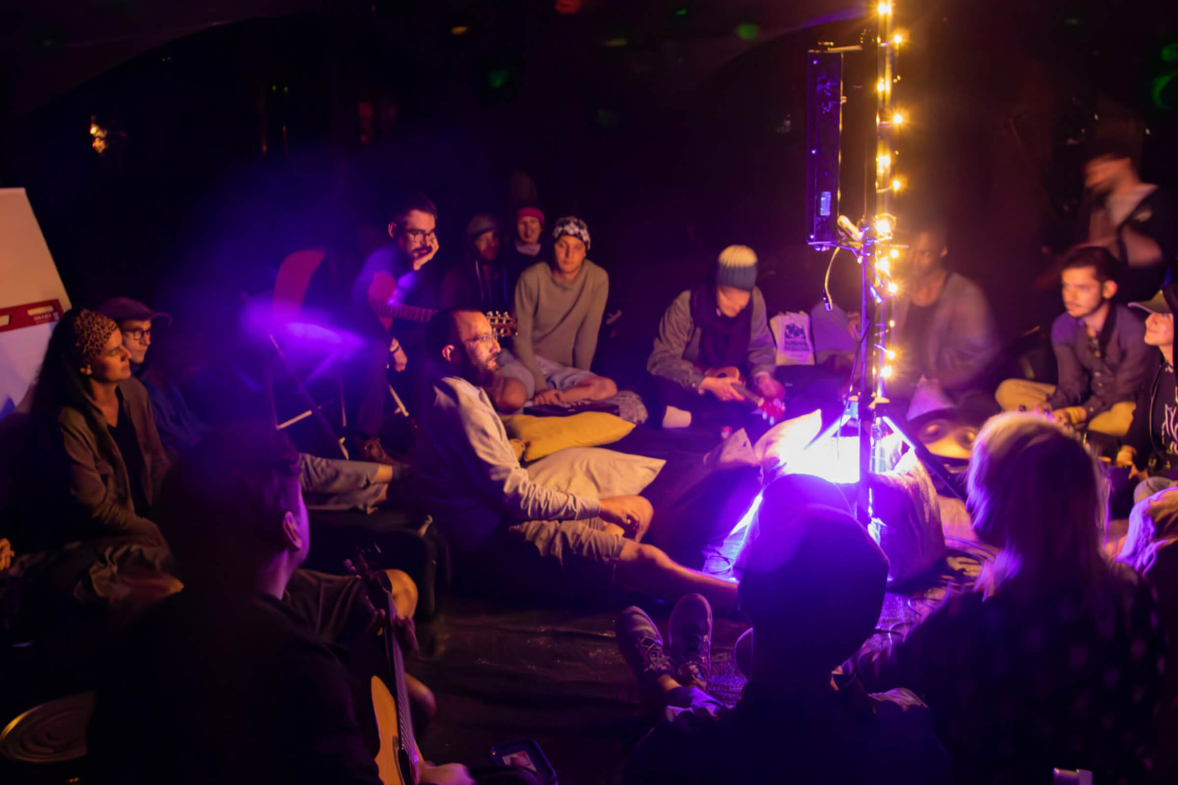 Late night acoustic music jams in the Forest Pavillion, organized by Micah Fitch.